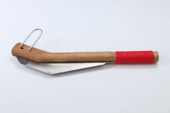 sickle garden tool by designer