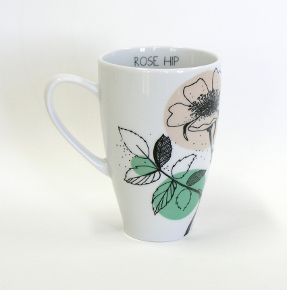 tea mug with rose hip decoration by kristoff fine porcelain