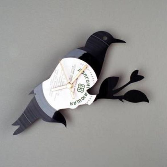 bird wall clock made of vinyl record